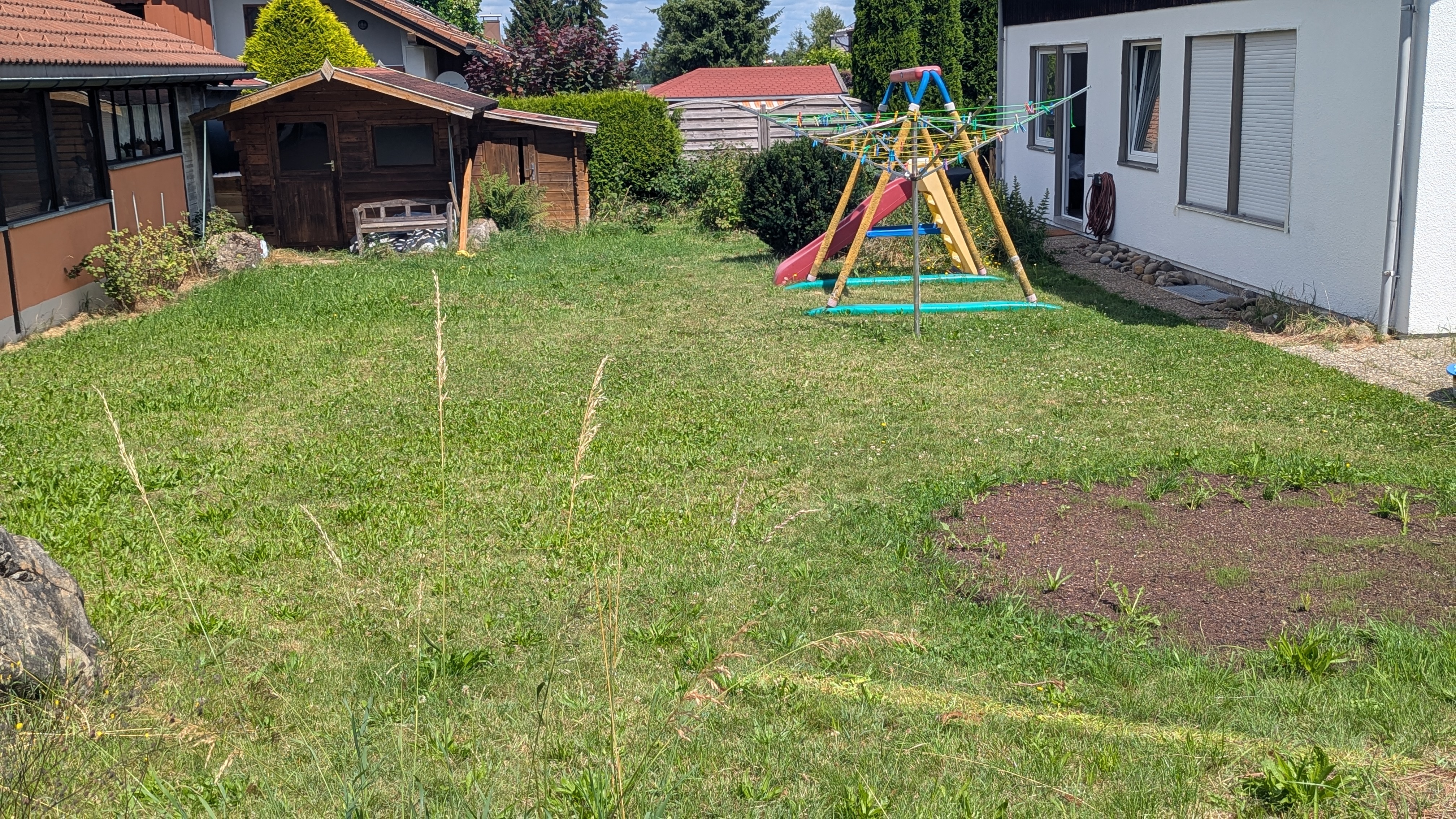Eingezäunter Garten für Hunde und Kinder